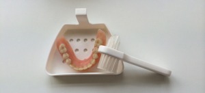 how to clean dentures